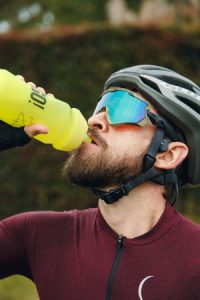 Cyclist Drinking From a Bidon