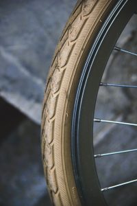 A photograph of a wide road bike tyre